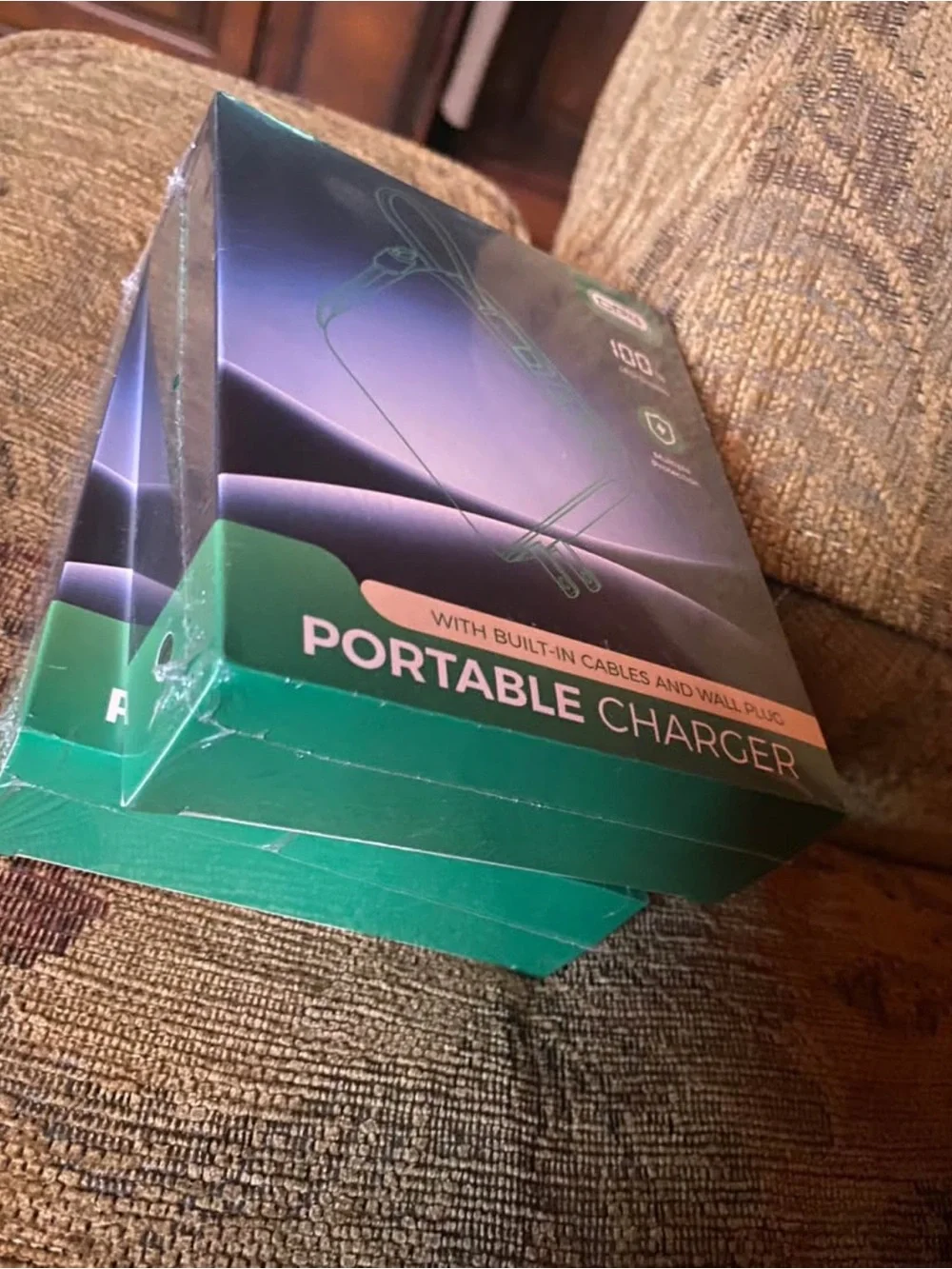 NIB set of 2 Portable Charger with built-in cables and a wall plug